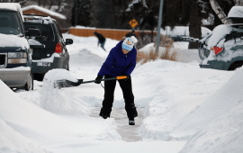 person shoveling snow