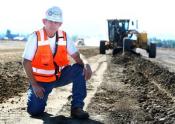 airport board member craig thomas pictured with the airport runway expansion project.